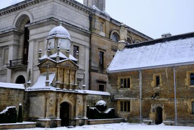 Gate of Honour at Gonville & Caius College Cambridge covered in a light dusting of snow