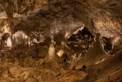 A high viewpoint affords visitors a quarter-mile-long glimpse into the Big Room’s ornate features at Carlsbad Caverns National Park.