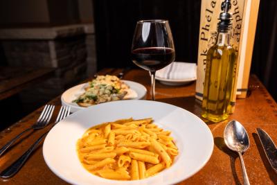 pasta with glass of red wine