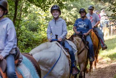 Child horseback riding at Shelby Trails