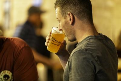 Man Drinking Seventh Tap Beer