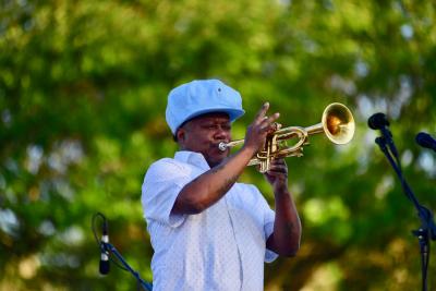 See world-renowned regional artists like Kermit Ruffins at the Covington Trailhead Rockin' the Rails free concert series.