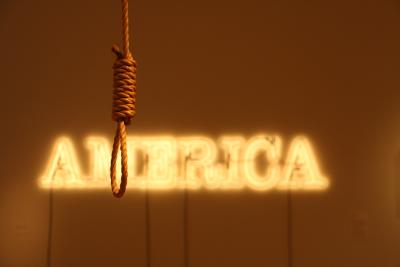 Duck, Duck, Noose by Gary Simmons and America by Glenn Ligon meld together in 30 Americans, on display at the Tacoma Art Museum in Tacoma, Washington