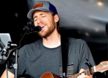 Luke Perring performing. He will be featured at the Timber Jamboree by the Peace River Botanical & Sculpture Gardens on October 11, 2025.