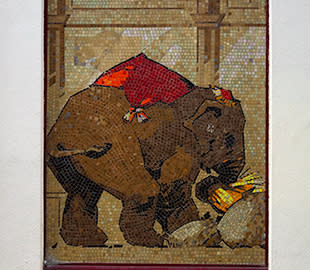 A close up view of a mosaic of an elephant on display in Cheltenham