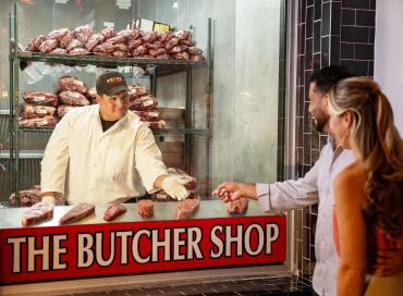 Live, on-site butcher shop offering custom cuts at Prime Serious Steak in Port Charlotte, Florida