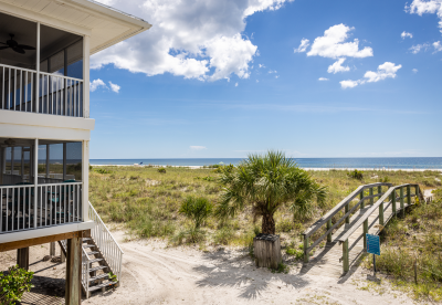 Vacation rental near a bridge to the beach on Knight Island/Palm Island Resort on a sunny September day.