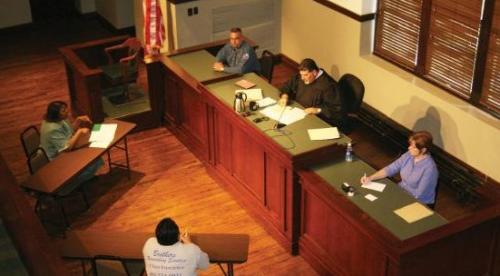 Historic Collin County Courthouse judge's bench with Judge Raleeh