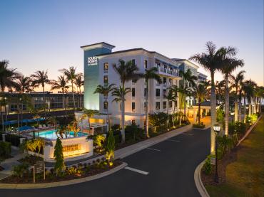 Evening view of the refreshed exterior of the Four Points by Sheraton Punta Gorda Harborside.