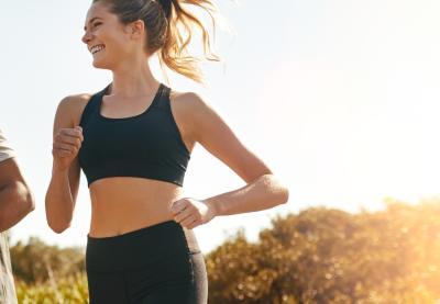 Two people running in nature