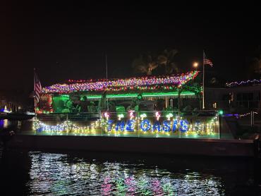 Summer night cruise aboard The Oasis by Punta Gorda Adventures, a 30-person capacity tiki boat cruising Charlotte Harbor in Punta Gorda/Englewood Beach, Florida.