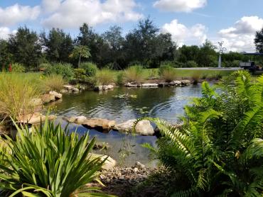Pond and Rondelet sculpture at Peace River Botanical & Sculpture Gardens