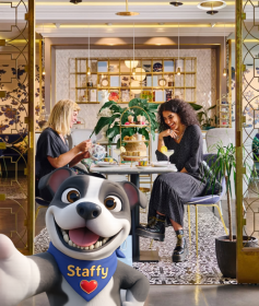 Staffy taking selfie with two ladies enjoying afternoon tea at World of Wedgwood.