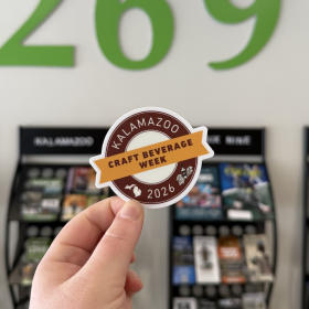 A sticker features the rounded logo of Kalamazoo Craft Beverage Week
