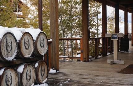 High West Whiskey Barrels covered in snow