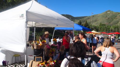 Flower vendor booth at golden farmers market