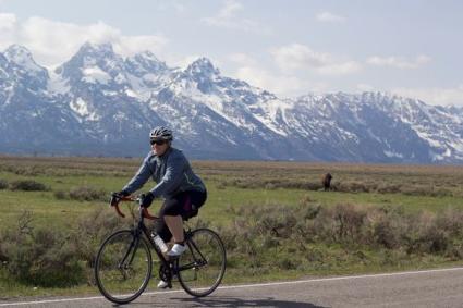 Women biking on Grand Teton Park Road