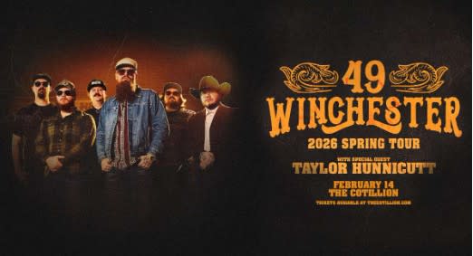 Band members of 49 Winchester pose fora  photo