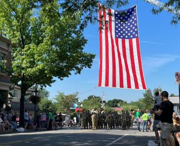 picture of a giant American Flag at the Lewisburg July 4th Parade.