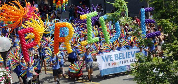 Rainbow balloons spelling out the word "PRIDE" during Columbus Pride parade