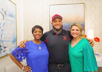 Zondra and Katie in the studio with Gerrin Narcisse of the Bayou Lacombe Cardinals amateur football team.