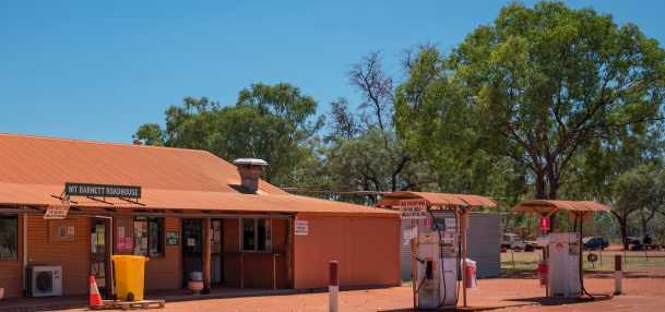 View of the exterior of the Mt Barnett Roadhouse and fuel bowsers on the Gibb River Road