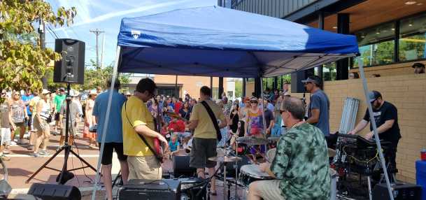 Band Playing in Front of CommunityWorx Thrift Shop at Carrboro Music Festival