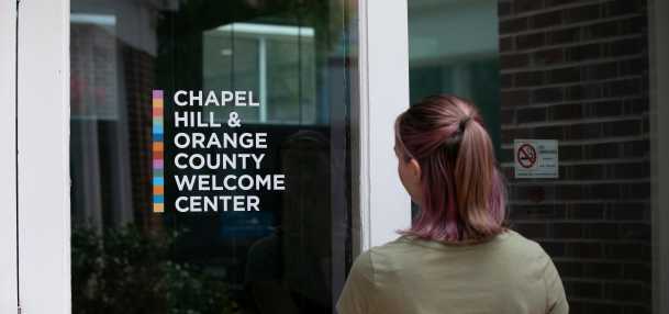 Person Entering the Welcome Center Front Door