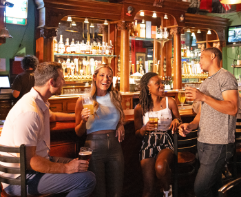 Four friends toasting at IceHouse Pub in Punta Gorda, Florida
