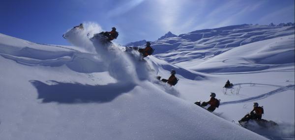 Snowmachines traveling in the Chugach Mountains