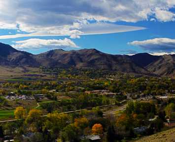 golden-landscape-town-mountains
