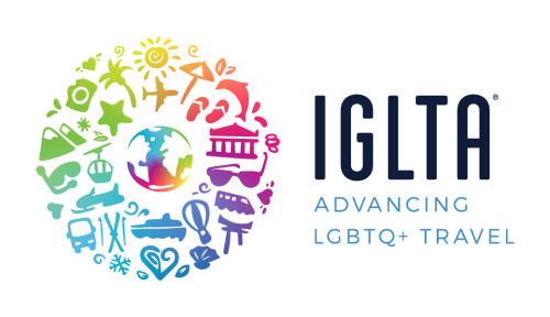 The logo for the International Gay and Lesbian Tourism Association (IGLTA), reading IGLTA and Advancing LGBTQ+ Travel. There is a graphic with a globe surrounded by travel-associated icons like a boat, sunglasses, camera, umbrella, plane, and a museum all in a rainbow gradient.