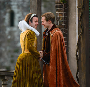 Image shows two men in costume performing one of Shakespeare's classic works