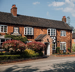 Image shows the front of The Meynell Ingram Arms pub, in Hoar Cross, near Burton upon Trent, Staffordshire