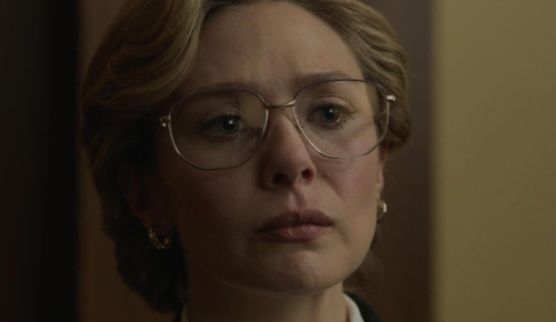 woman in wire framed glasses - serious