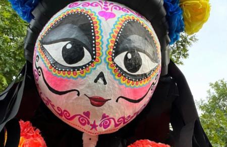 Puppet at Dia de los Muertos in McKinney - painted day of the dead face