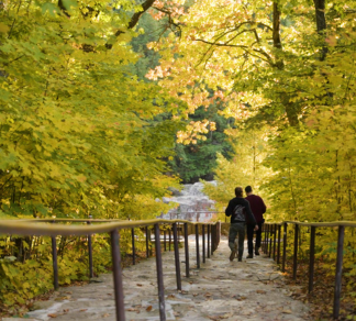 Two people walking down stairway at the Dells of the Eau Claire River