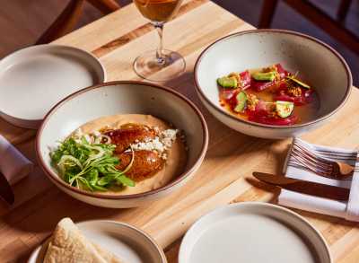 A table with food at Alma Fonda Fina in Denver, Colorado.