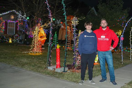 Bozak Family in front of lights show