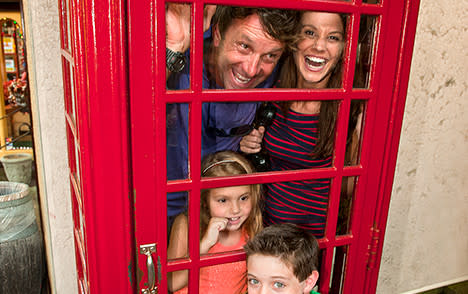 Family in Phone booth