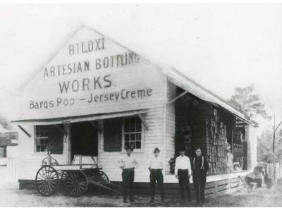 Historical image of Biloxi Artesian Bottling Works, the birthplace of Barq's Root Beer.