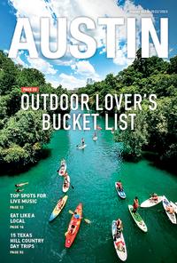 Austin Visitor Guide Magazine 2022/23 Cover with photo of paddle boarders on Lady Bird Lake