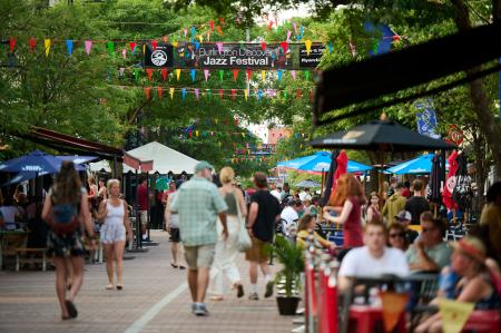 Church Street busy in the summer months, people walking and eating