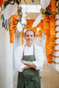 The Hive's Executive Chef Matthew McClure poses in the restaurant