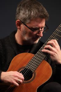 A portrait of classical guitarist Brad DeRoche, who plays at concerts, weddings and other Mackinac Island events.