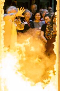 Sir Ian McKellen conjures a pyrotechnic doorway to celebrate the opening at St Catharine's College, Cambridge