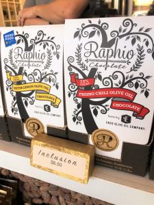 raphio olive oil chocolate on a store stand