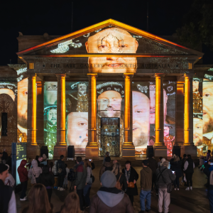 Festival at night time in Adelaide, Illuminate Adelaide. Picture of a building with projected images.