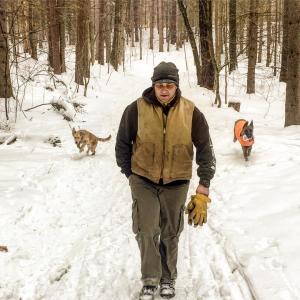 mani hiking in the winter with dogs