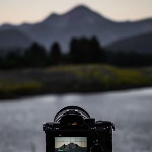 Photographer Shooting Engineer Mountain During Summer